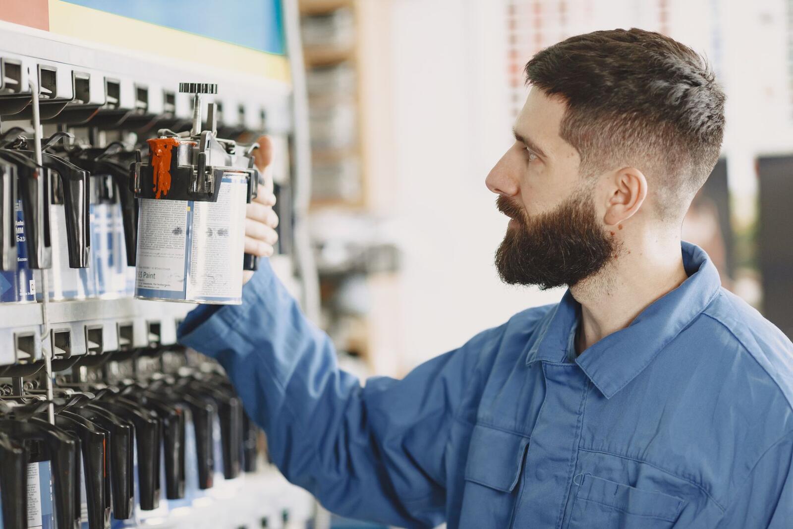 Technician at the parts shelf
